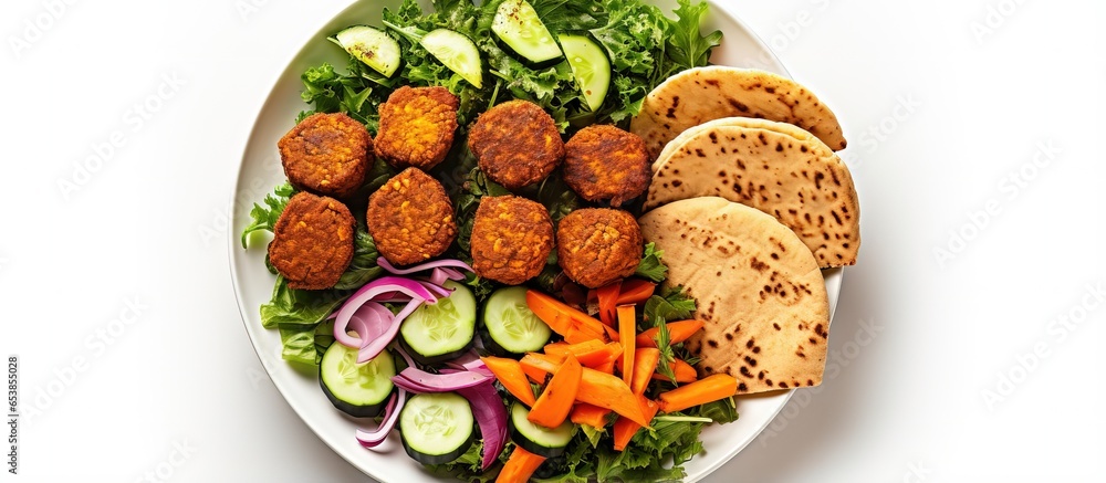 Vegan lunch with baked chickpea cutlets sweet potatoes and salad in a white bowl