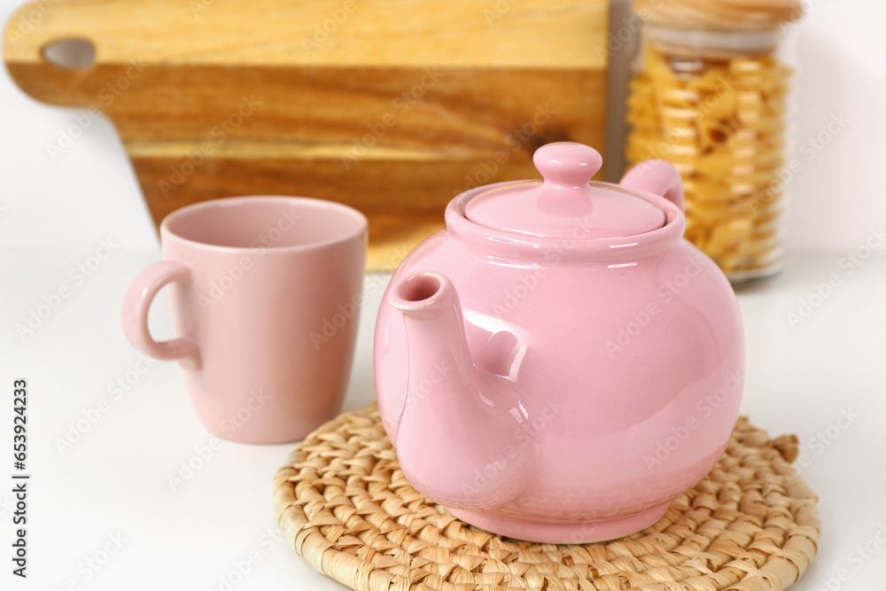 Composition with beautiful tea set and different items on white table