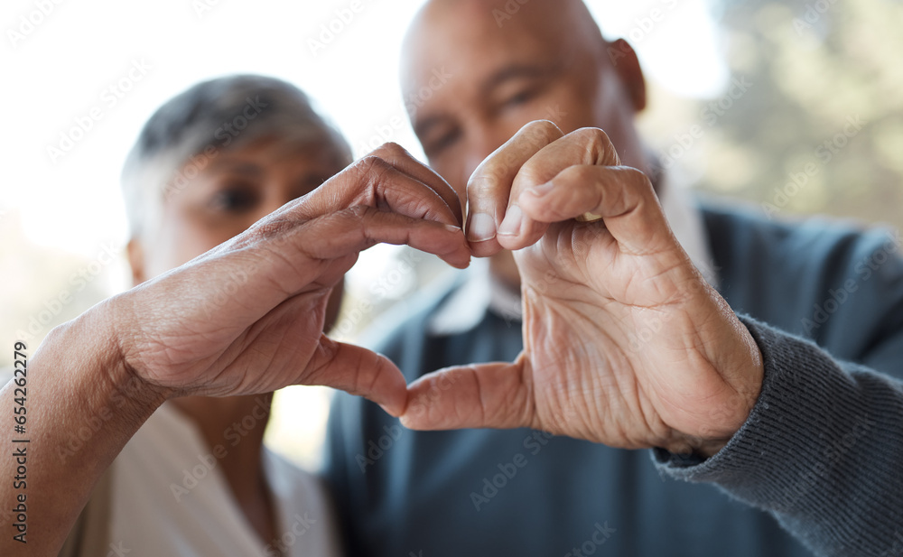 Marriage, heart hands and senior couple with care, romance and romance with bonding, relationship and retirement. Face, old woman and elderly man with love symbol, kindness and health with trust