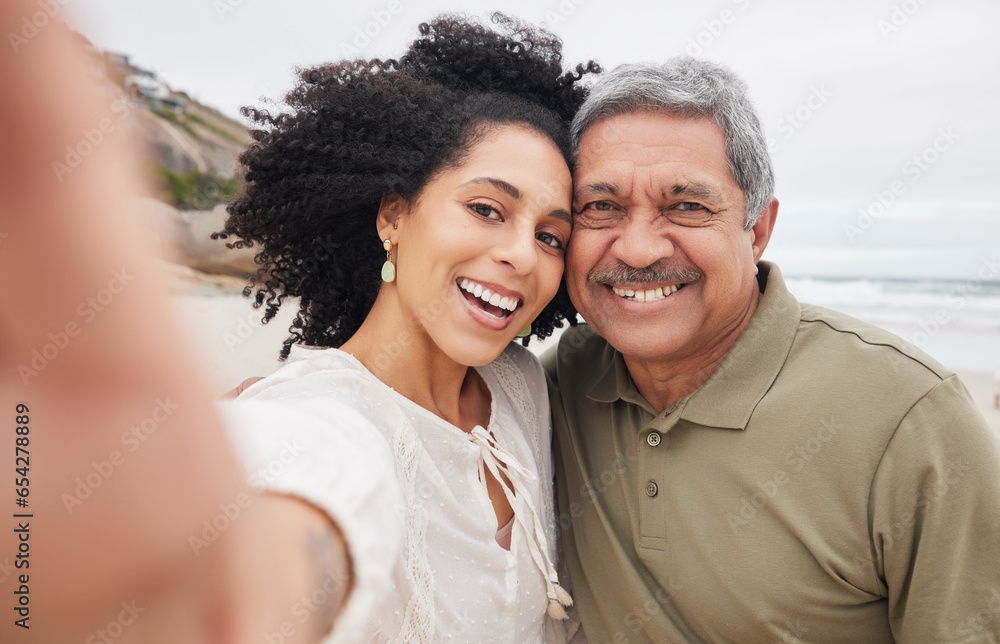 Portrait, selfie of woman and mature father at beach on vacation, holiday or travel outdoor. Face, picture and dad with adult daughter at ocean for care, happy family bonding or smile together at sea