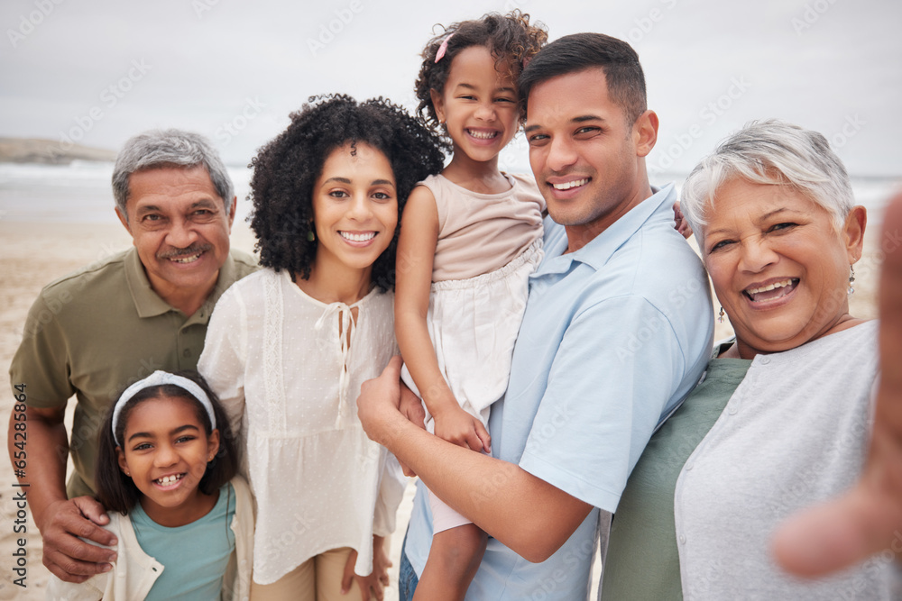 Portrait, happy and selfie of family at beach on holiday, vacation or travel outdoor. Parents, grandparents and kids at ocean in profile picture for care, bonding together and smile for love at sea