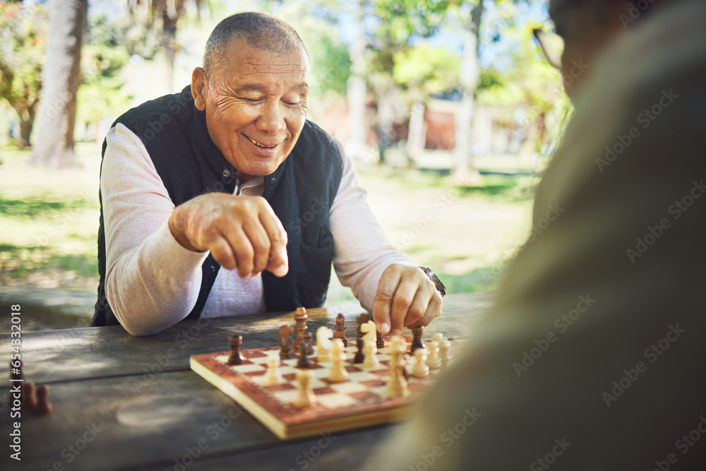 Happy, table and people in nature for chess, strategy and relax with a sport together. Smile, thinking and elderly or senior friends in retirement with games in a park on a board for competition