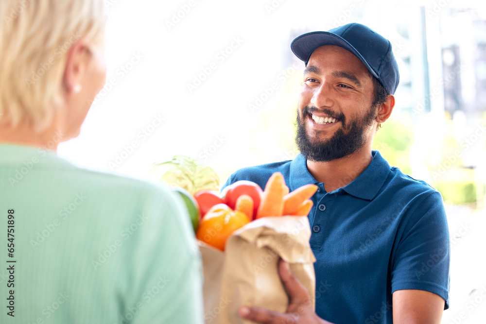 Delivery man, groceries and smile for customer, food and fresh produce from online shopping. Happy person, supermarket discount and deal from supply chain, distribution with front door service.