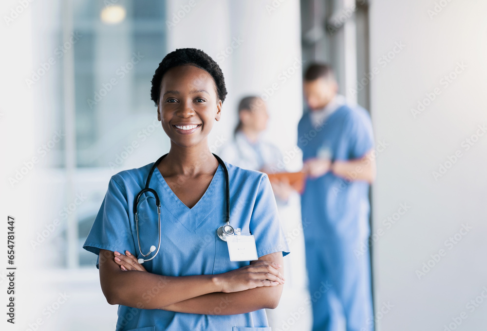 Happy, nurse and portrait of black woman with arms crossed in hospital for healthcare, wellness and nursing career. Face of African surgeon, confident medical professional worker and employee smile