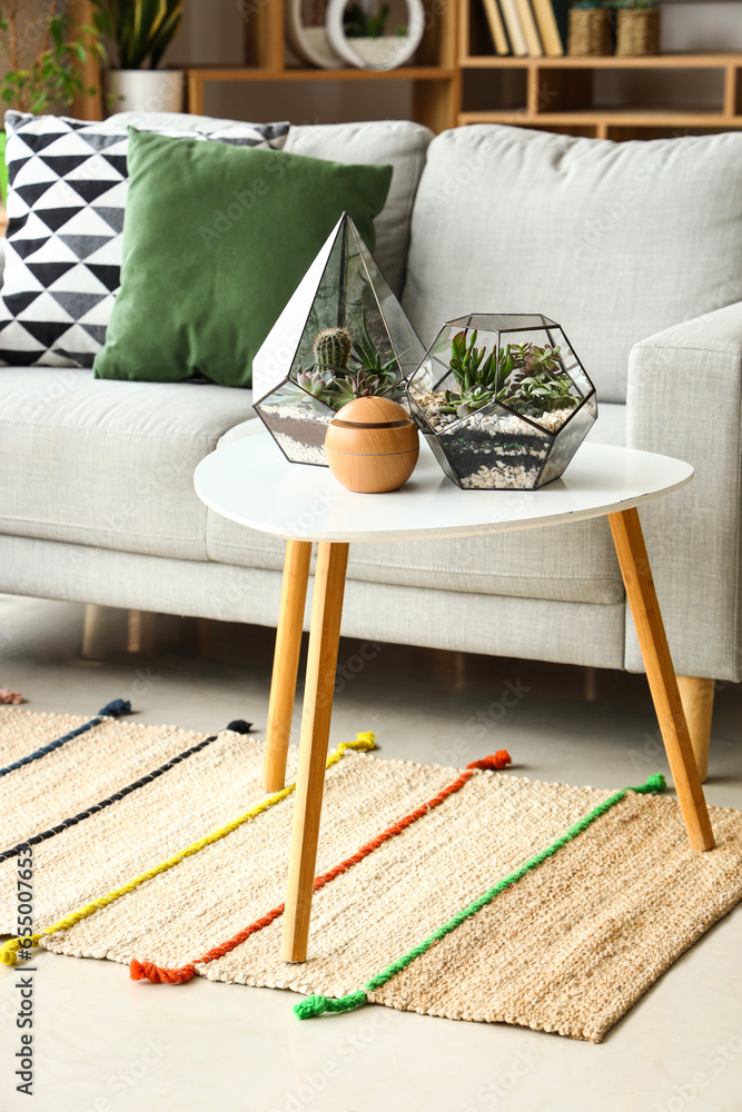 Florariums on table in living room