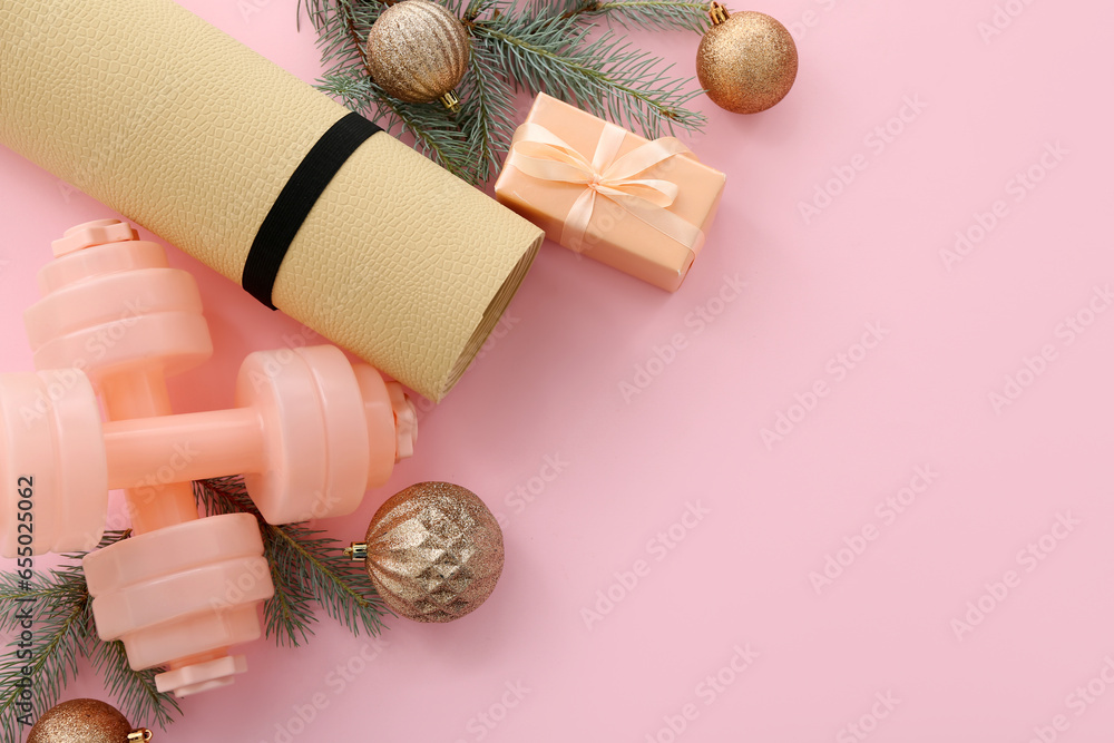 Sports equipment with Christmas decor on pink background