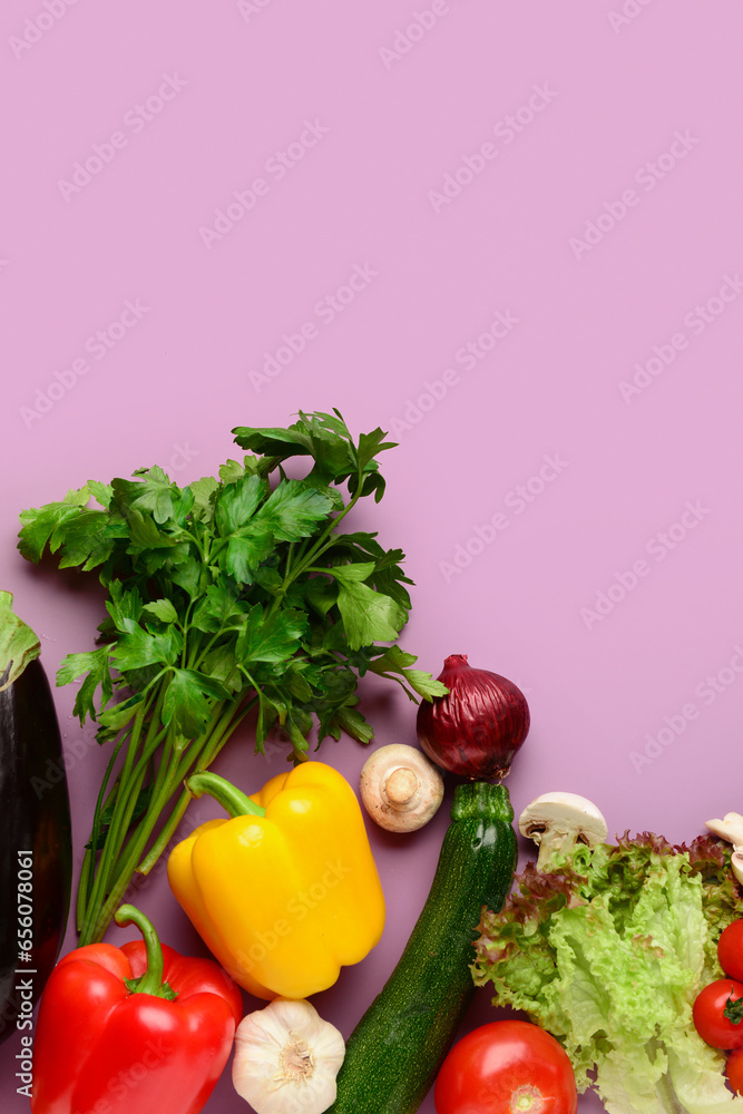 Different fresh vegetables on lilac background