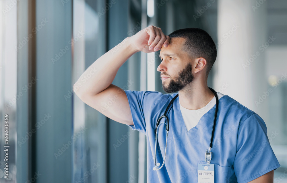 Window, doctor and man with stress, thinking and mental health with burnout, overworked and depression. Person, employee and medical professional with thoughts, healthcare and anxiety with doubt