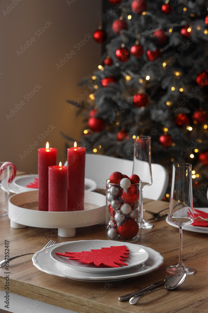 Festive table setting with Christmas decor at home