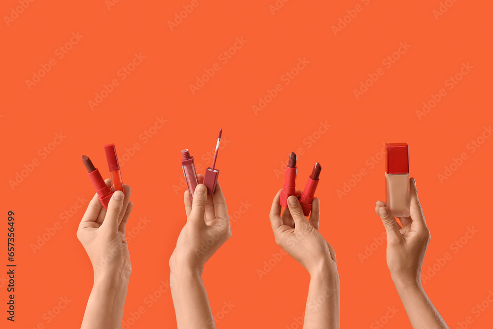 Women with lipsticks and makeup foundation on red background