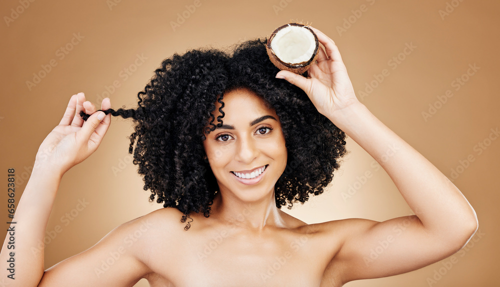 Woman, hair and coconut in portrait, beauty and product for wellness, oil or cream with cosmetics on studio background. Organic, eco friendly and haircare for growth and strong texture with fruit