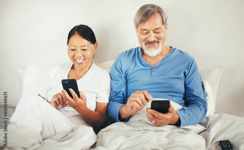 Phone, bed or senior couple on social media for communication, website or internet connection. People, search or mature happy woman with an Asian man online to post or scroll on mobile app at home