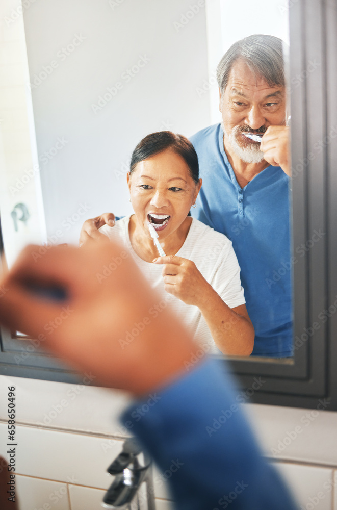 Senior couple, brushing teeth and mirror in bathroom, hygiene and dental, morning routine at home. Healthy people, wellness and oral care with grooming, toothpaste for cleaning mouth and reflection