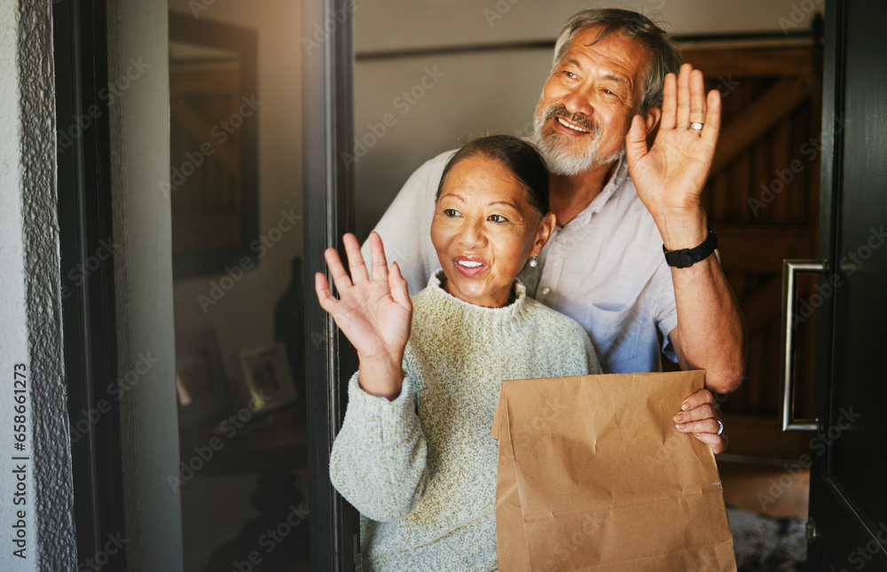 Mature couple, wave and delivery of package in home, commerce or cargo service at door. Asian man, happy woman and goodbye hand sign for communication, thank you for shipping parcel or smile together