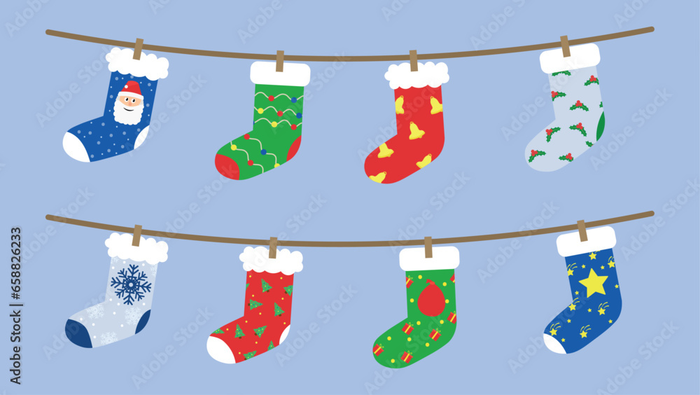 Many beautiful Christmas socks hanging on rope against color background