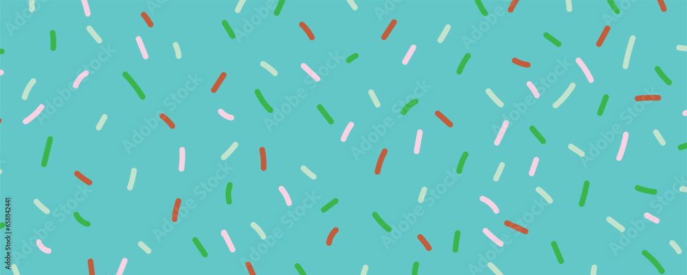 Colorful sprinkles on light blue background