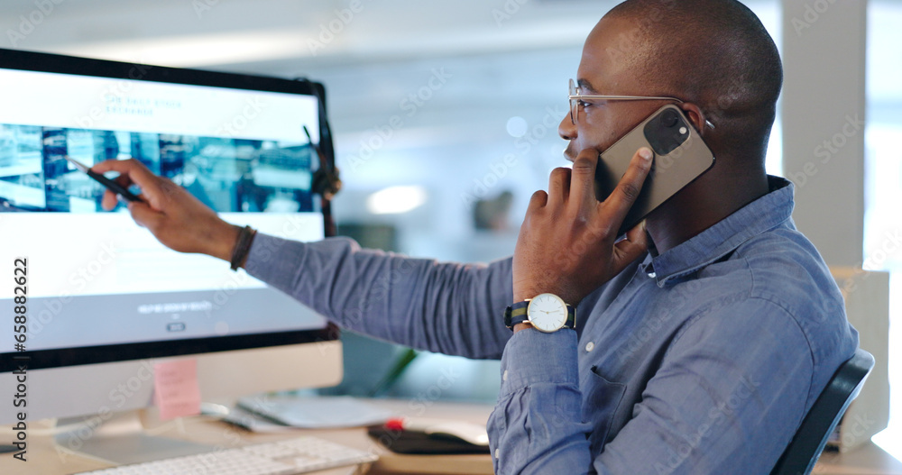 Businessman, phone call and pointing at computer in office while talk, consult or listen. Black person, analyst or developer for customer service with communication, feedback or support on website