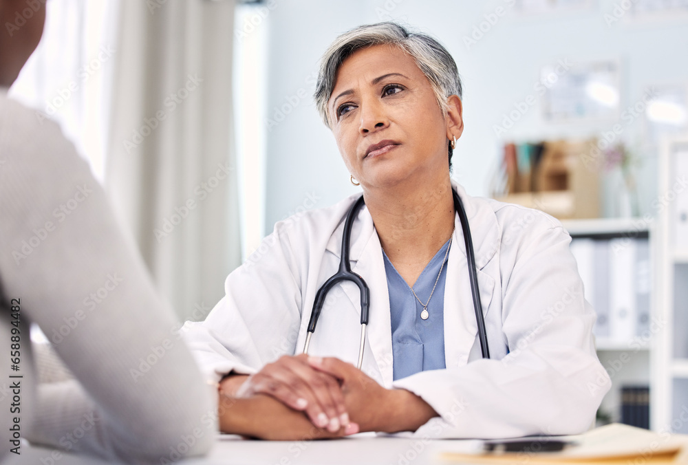 Medical, holding hands and doctor with woman in clinic for support. empathy or care. Checkup, discussion and closeup of female healthcare worker with sympathy for patient in medicare hospital.