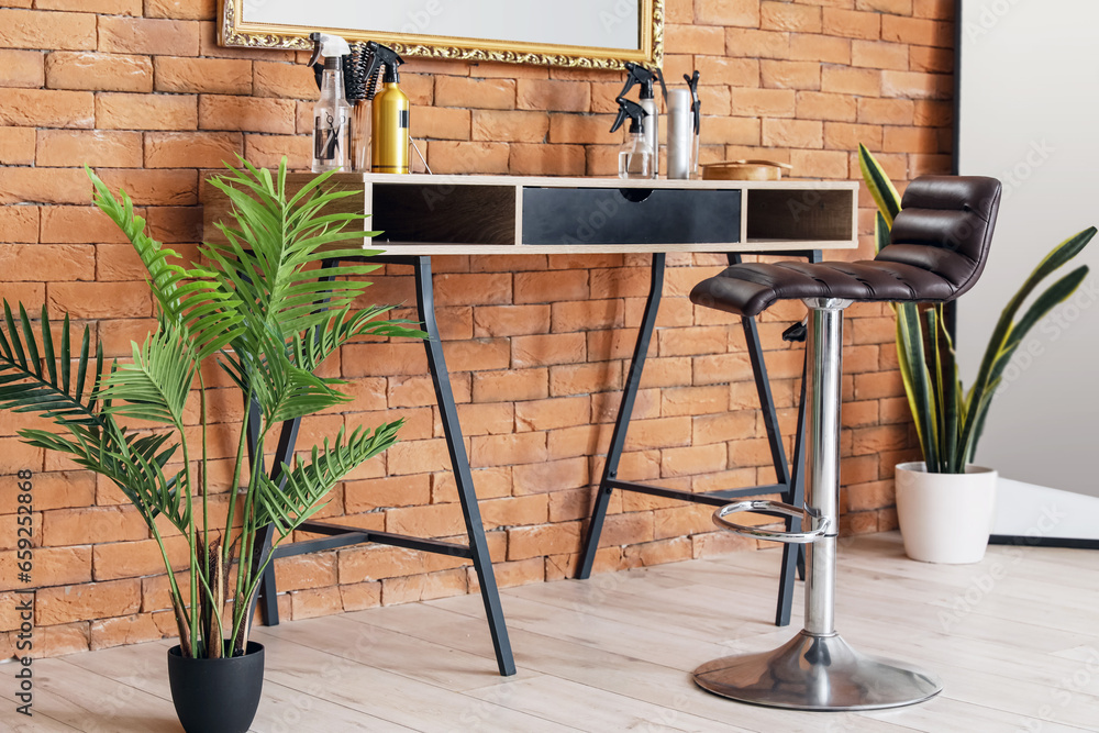 Interior of beauty salon with hairdressers workplace