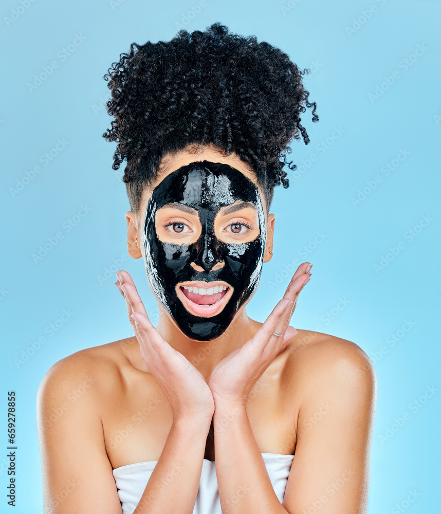 Skincare, charcoal mask and portrait of woman for facial treatment, anti aging detox and wellness. Beauty, studio and face of person with products for health, cosmetics or grooming on blue background