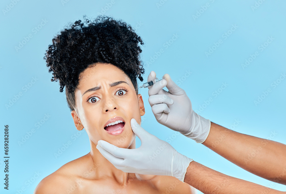 Filler, portrait of scared woman with hands on face in studio for collagen skincare consultation. Model with stress, fear and anxiety for beauty, dermatology or cosmetic process on blue background.