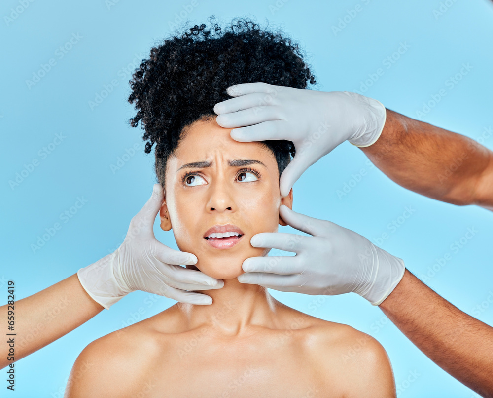 Skincare, plastic surgery and fear, woman with hands on face in studio for cosmetic consultation. Model with stress, worry and anxiety for beauty, dermatology or collagen therapy on blue background.