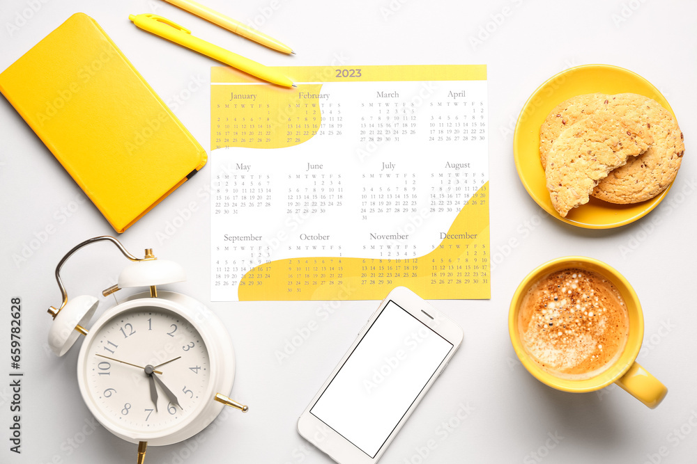 Composition with calendar, mobile phone, alarm clock, cup of coffee and cookies on grey background