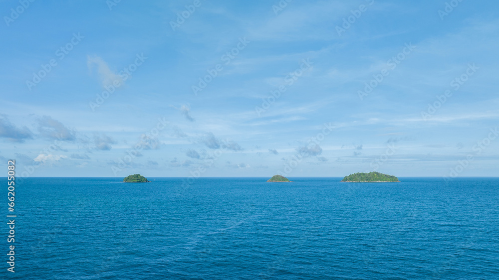 Seascape with small island. Blue sea surface from above, sea from a drone. Beauty of nature concept backgroun. beautiful island