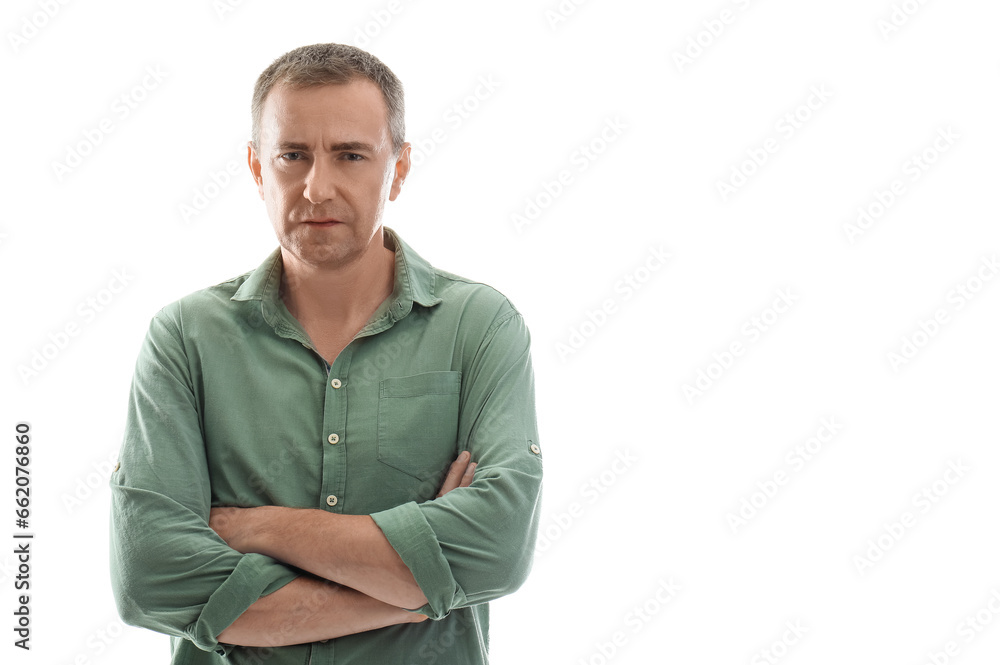 Portrait of serious mature man with crossed arms on white background