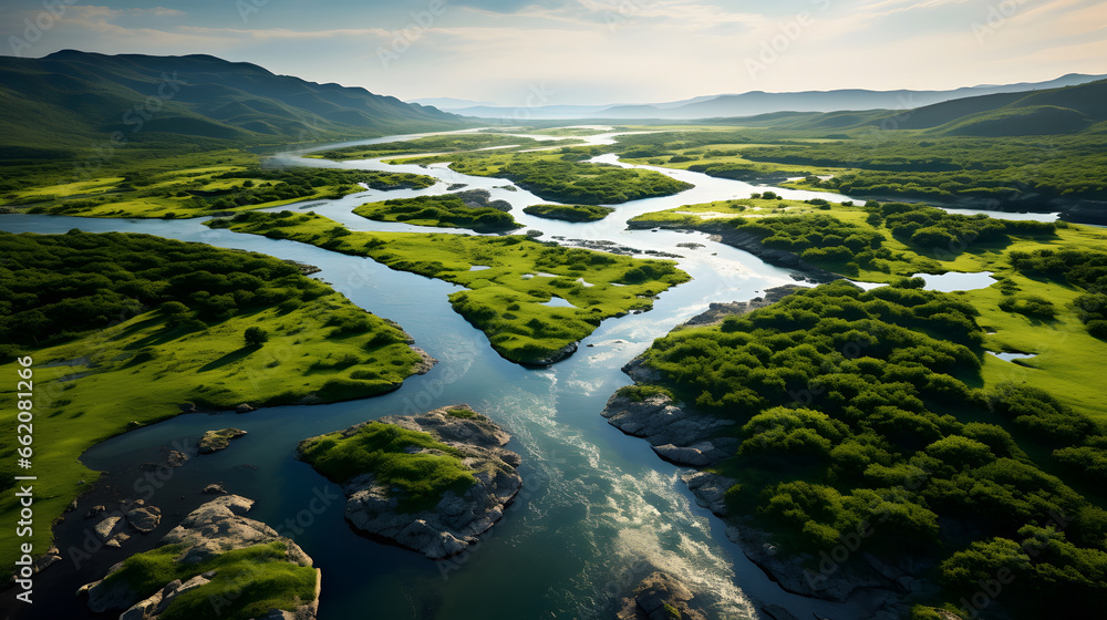 Aerial view of a river delta with lush green vegetation and winding waterways.