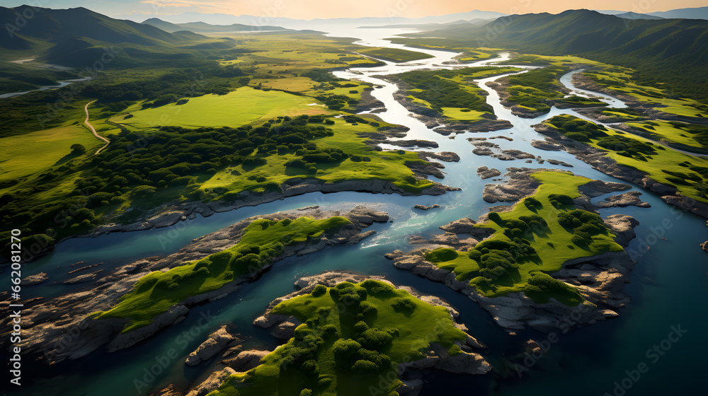 Aerial view of a river delta with lush green vegetation and winding waterways.