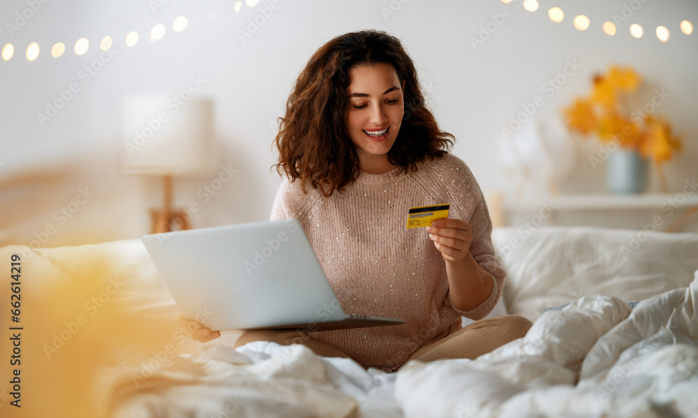 Woman is doing online purchases