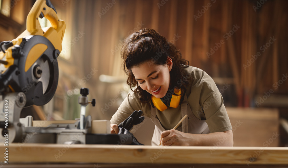 carpenter is working in workshop