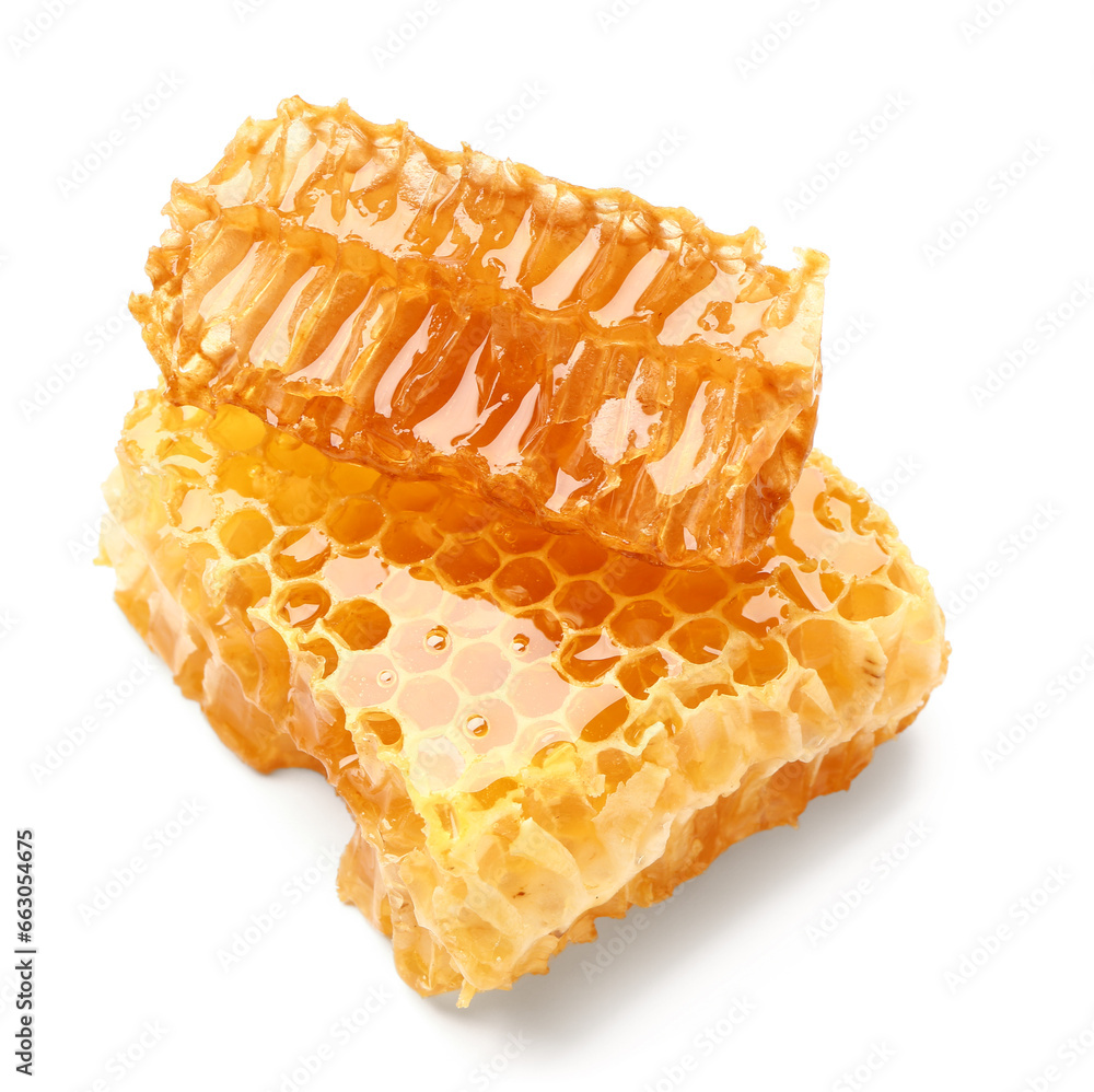 Sweet honeycombs on white background