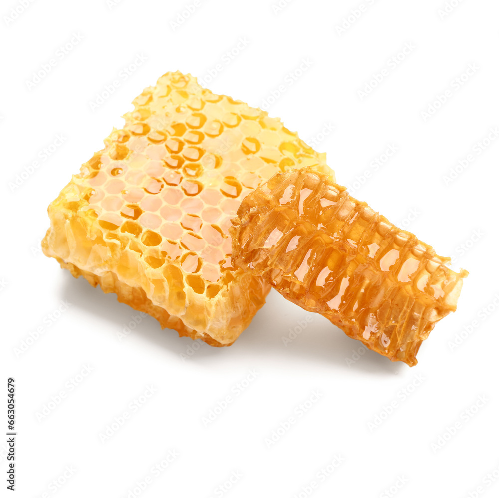 Sweet honeycombs on white background