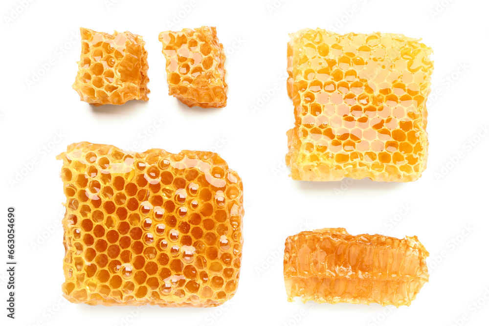 Sweet honeycombs on white background