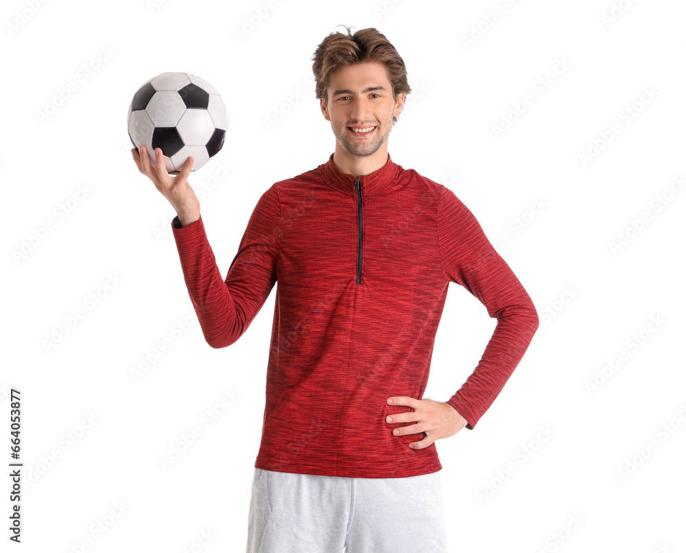 Young handsome man in sportswear with soccer ball on white background