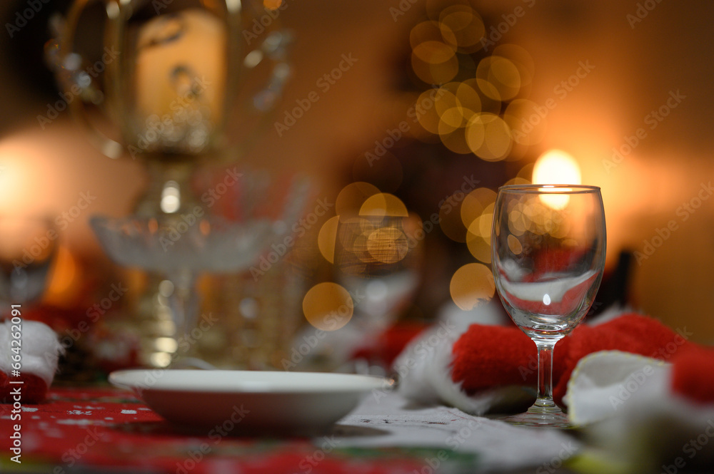 Close-up of wine glasses on the dining room table at Christmas and New Year