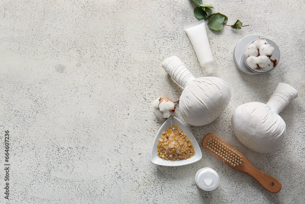 Spa composition with cotton flowers on light background