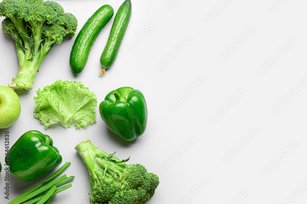 Fresh vegetables and fruits on white background