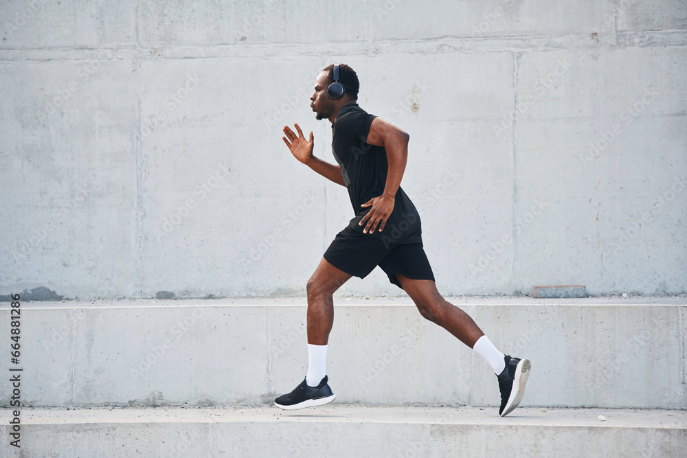 Active lifestyle. Sportive black man is running, morning routine