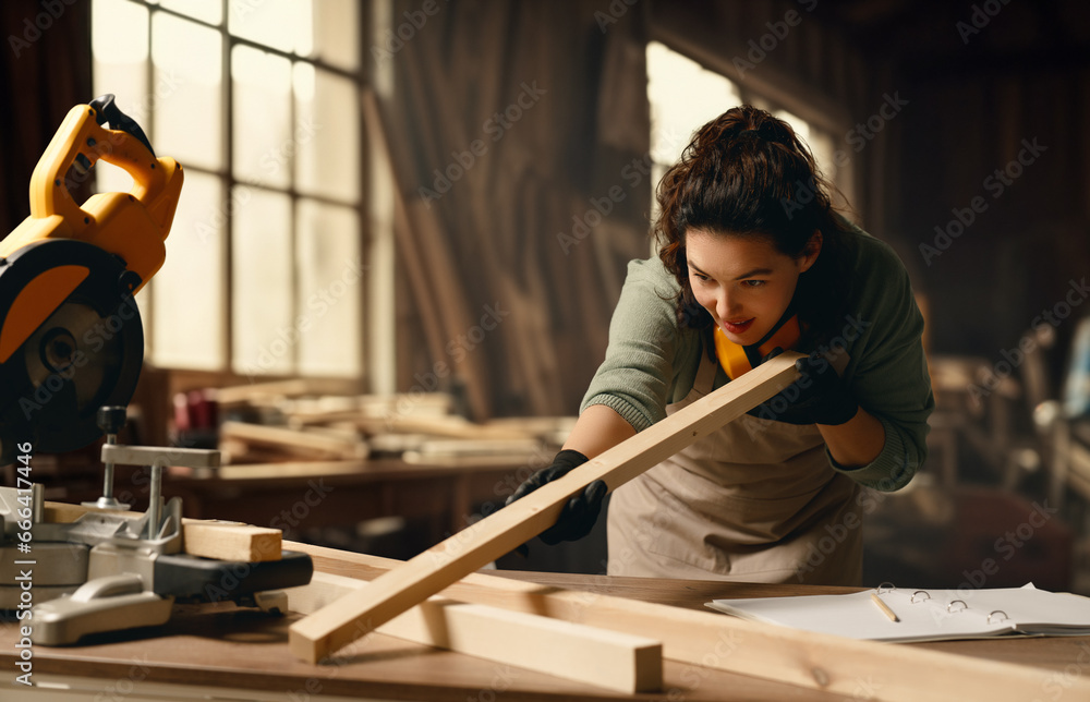 carpenter is working in workshop