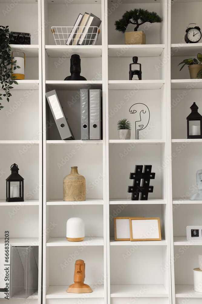 Shelving unit with folders and decor in office