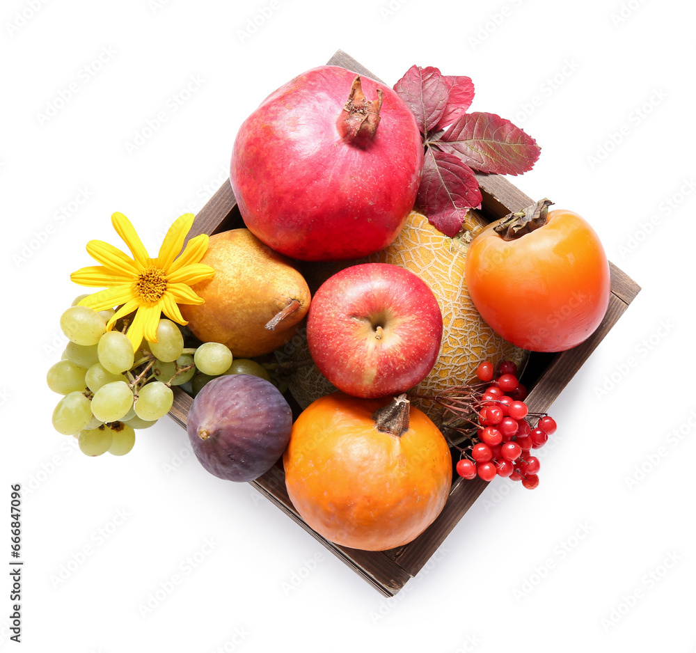 Wooden box with different fresh fruits on white background