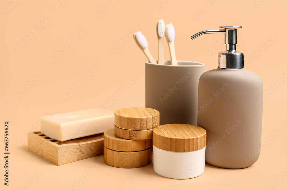 Set of different cosmetic products and toothbrushes on color background