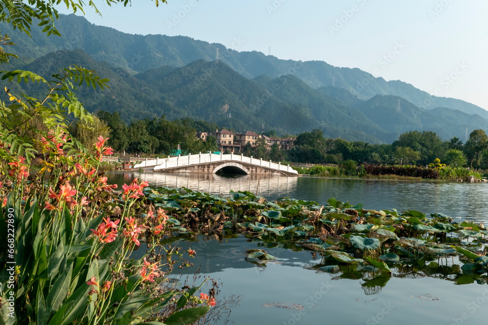 Stone arch bridge on the lake，Beautiful Longshui Lake Wetland Park, Chongqing, China