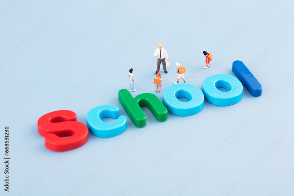 Miniature creative school children go to school