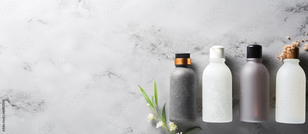 Minimalist beauty blogger showcasing spa cosmetic products on a gray concrete table