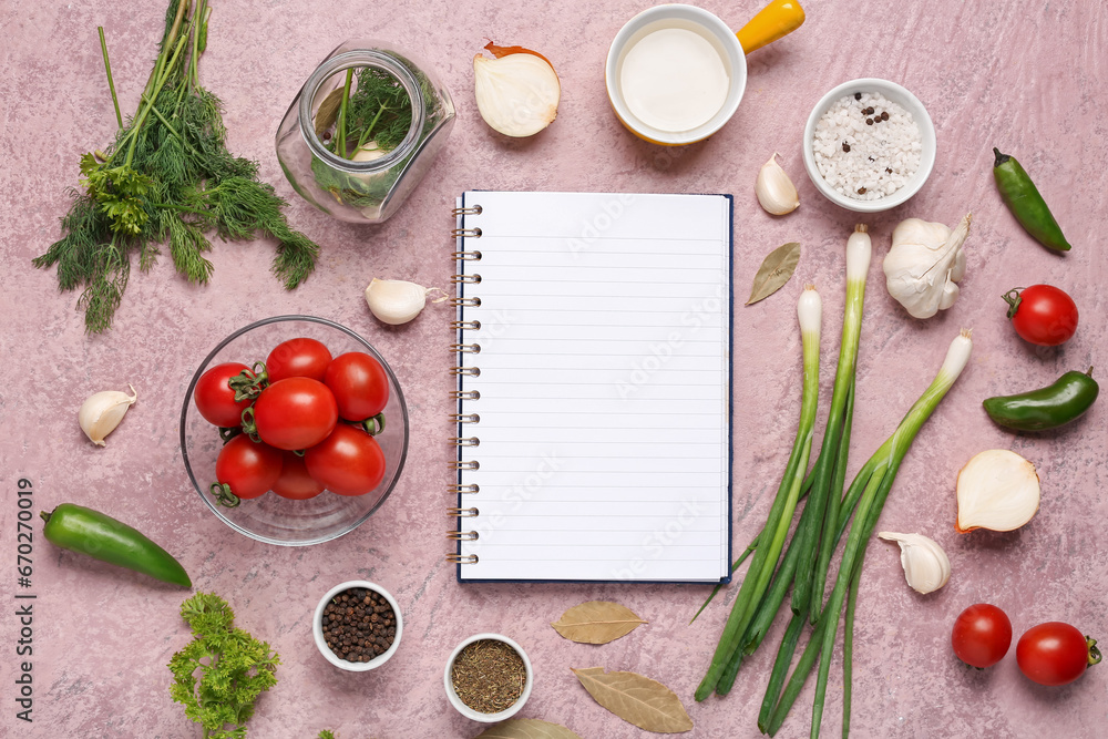 Composition with blank recipe book, fresh vegetables and spices on color background