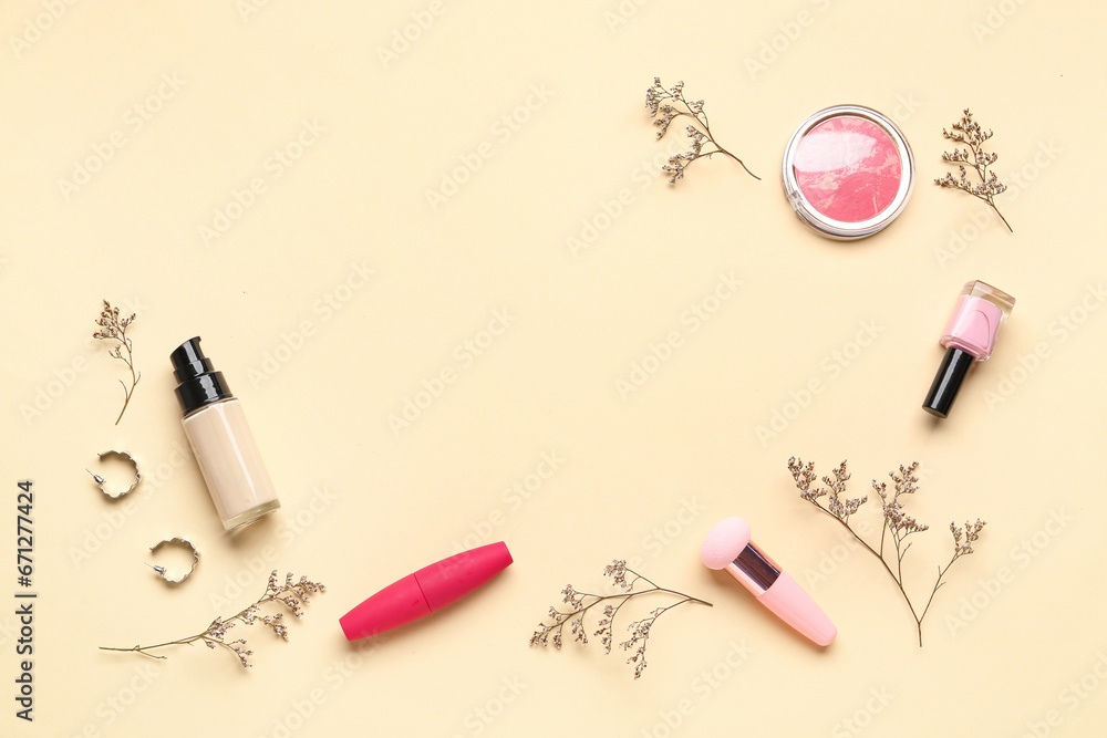 Composition with makeup products and beautiful flowers on beige background